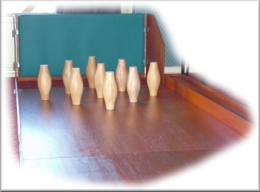 mobile skittle alley showing 9 pins in diamond. mobile skittle alleys to buy or hire